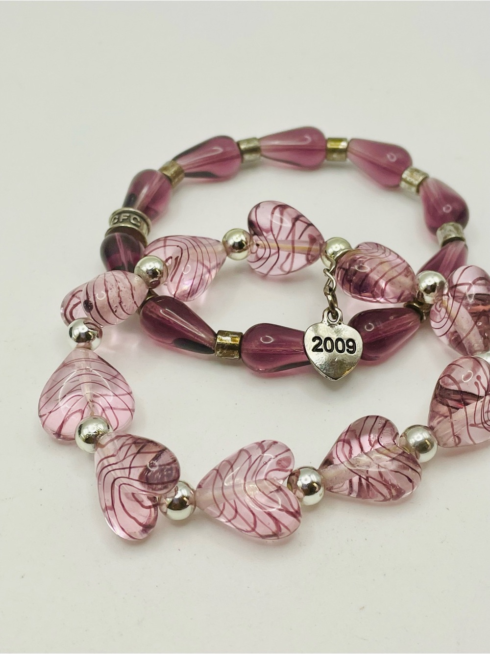 Purple Glass Heart Bead and Teardrop Stretch Bracelets with 2009 Charm. 6 3/4 in
